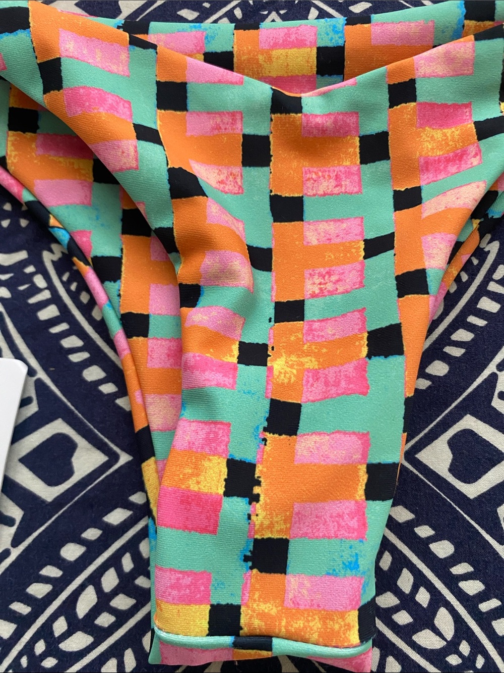 Skatie ' bikini bottoms in a colorful checkered "RADICAL" print - Picture 3 of 6
